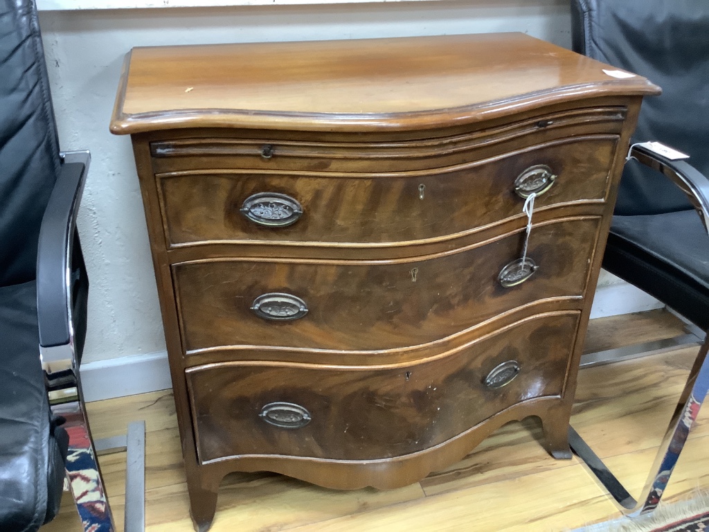 A George III design mahogany serpentine chest, brushing slide and three drawers, width 77cm depth 49cm height 76cm